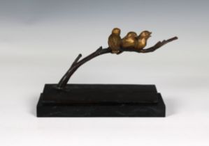 A bronze figure group of three song birds on a branch