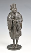 A Japanese patinated bronze figure - The Tea Merchant