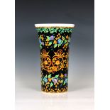 A Rosenthal Versace 'Gold Ivy' cylindrical flared vase, foliate design with gilded highlights