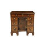 A Fine George II walnut kneehole desk