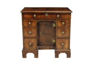 A Fine George II walnut kneehole desk