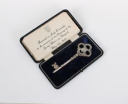 A silver presentation key in fitted case