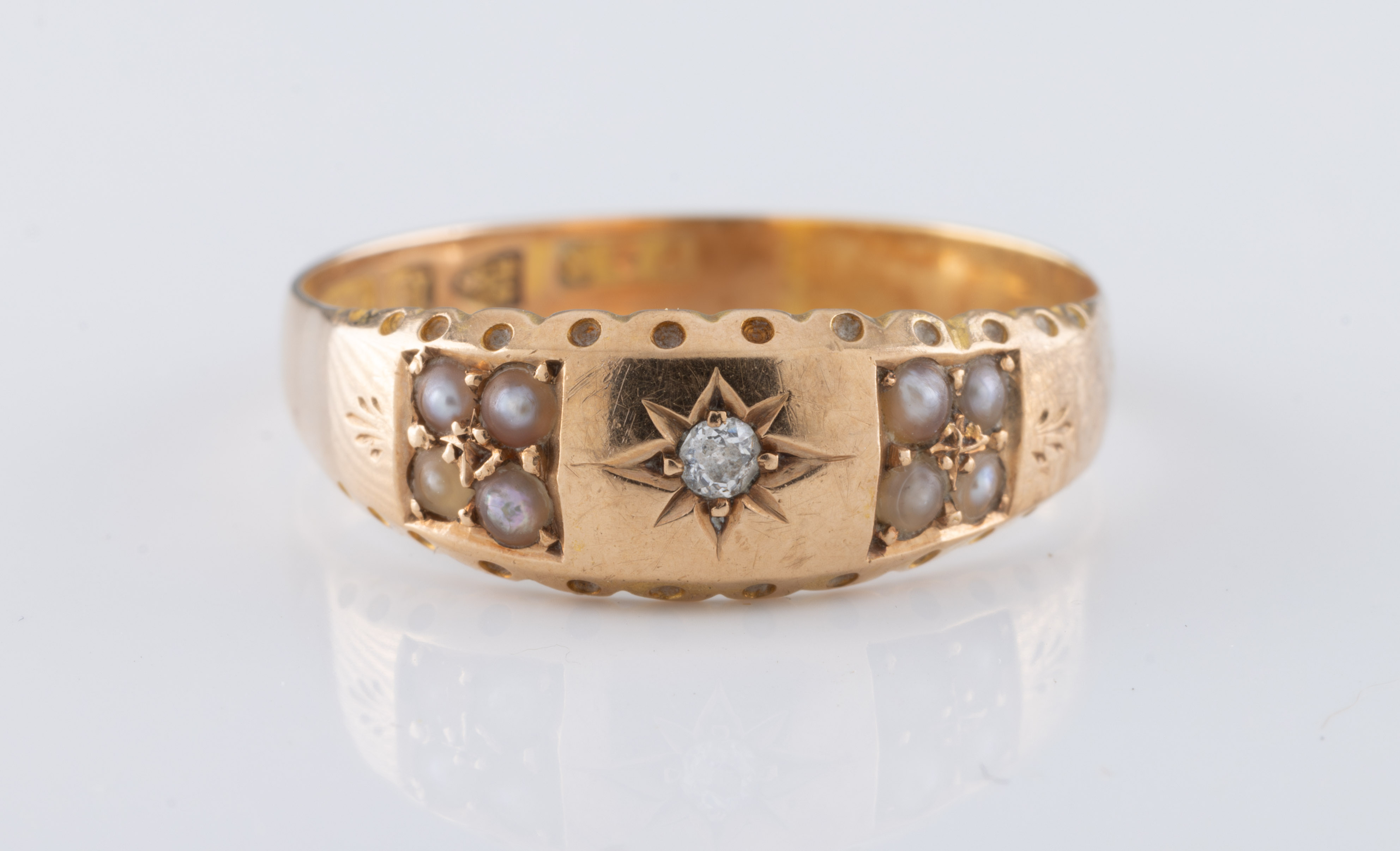 A 15ct gold diamond and pearl ring