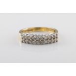 An 18ct yellow gold half eternity diamond ring