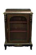 An early 20th century ebonised and Boulle inlaid pier cabinet