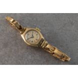 A Shield 9ct yellow gold ladies bracelet watch