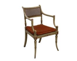 Regency style painted caned elbow chair