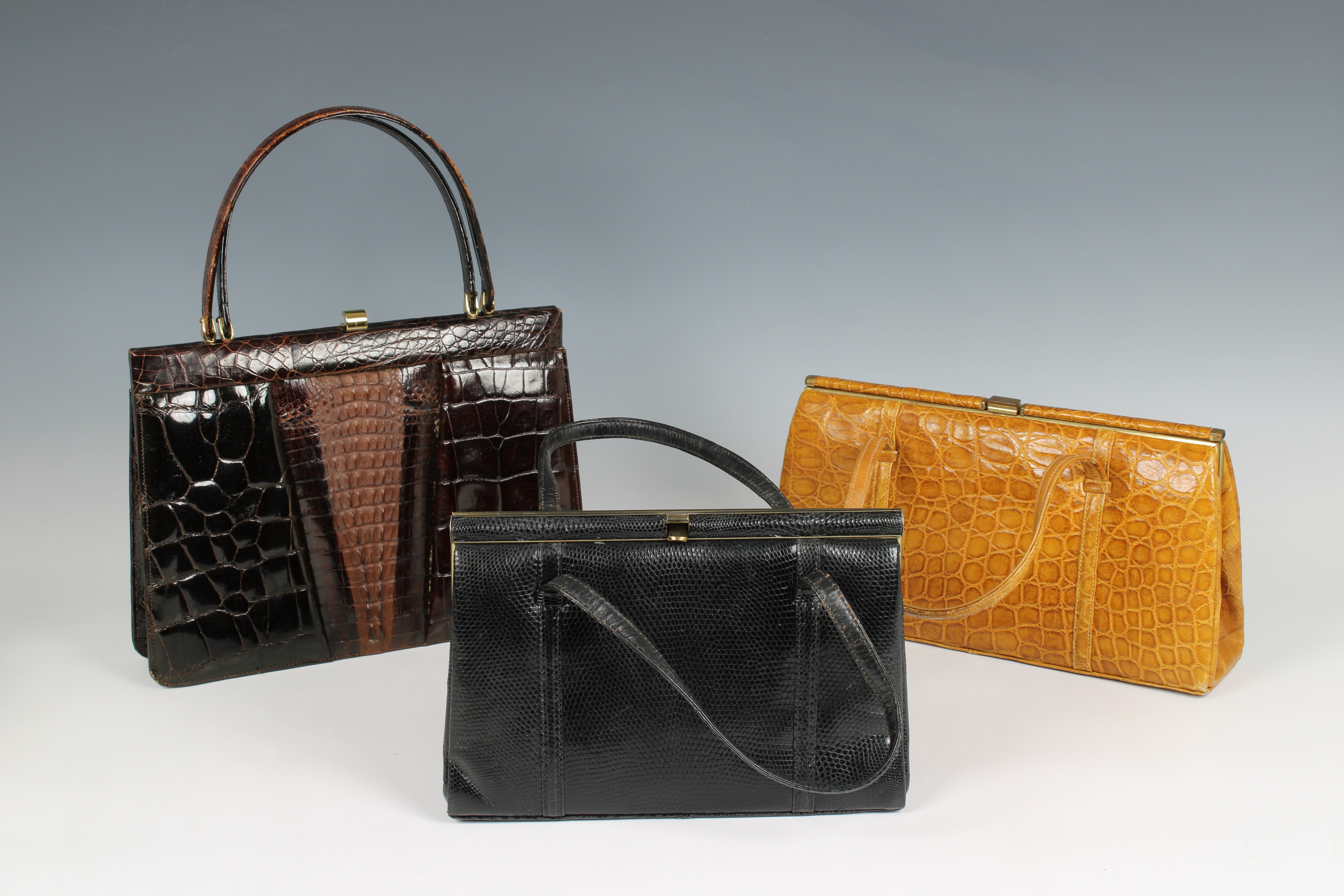 Two crocodile skin vintage handbags by Fassbender
