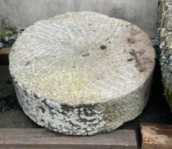 A granite mill stone