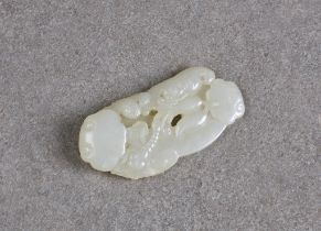 A Chinese very pale celadon jade carving