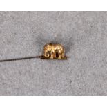 A novelty miniature 15ct yellow elephant brooch / pin