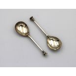 A pair of silver seal top spoons
