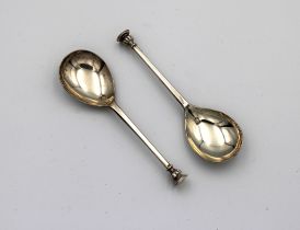 A pair of silver seal top spoons