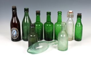 A collection of vintage / antique Guernsey bottles