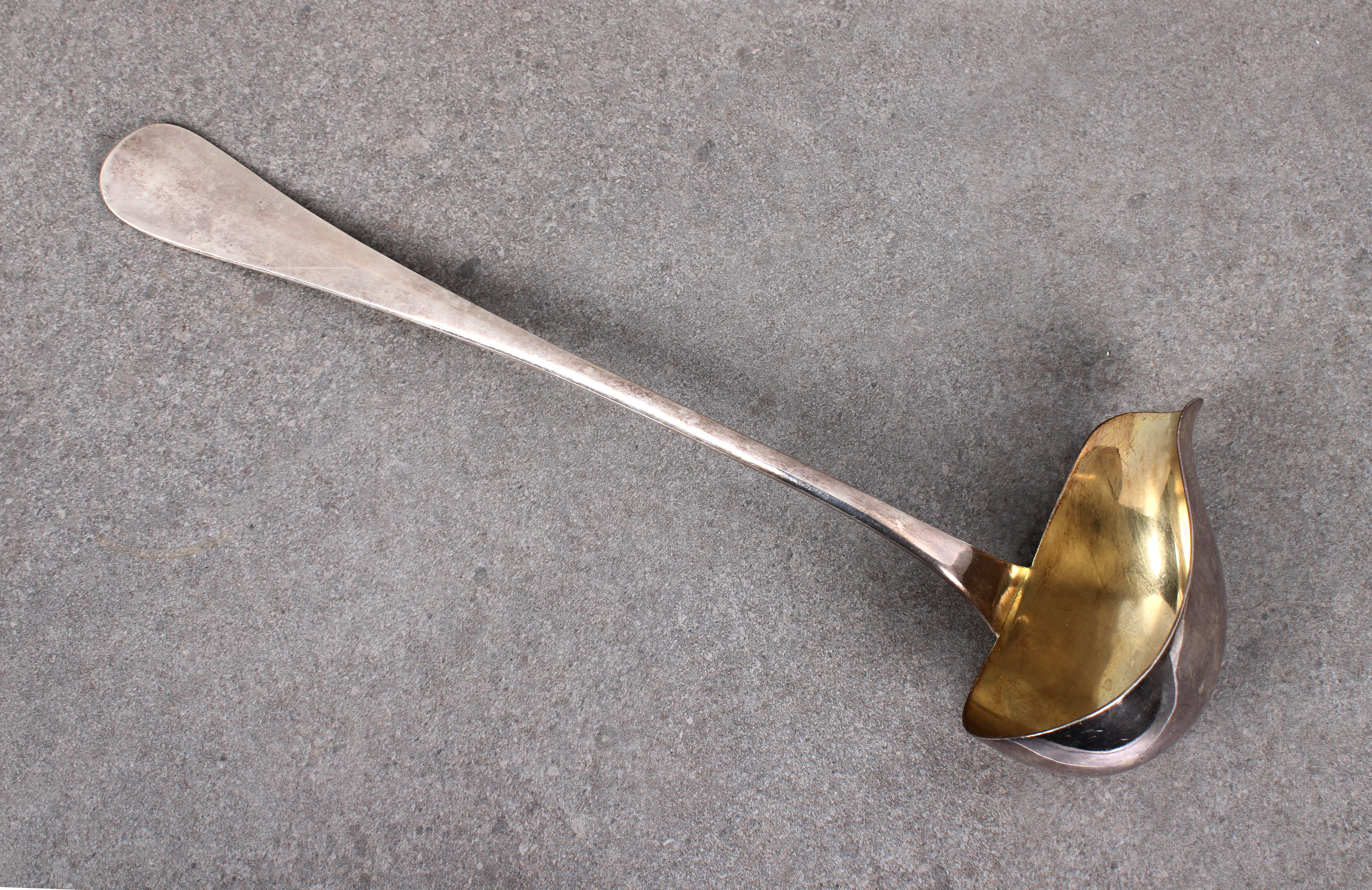 A large Hanoverian silver plate brandy warming spoon or ladle