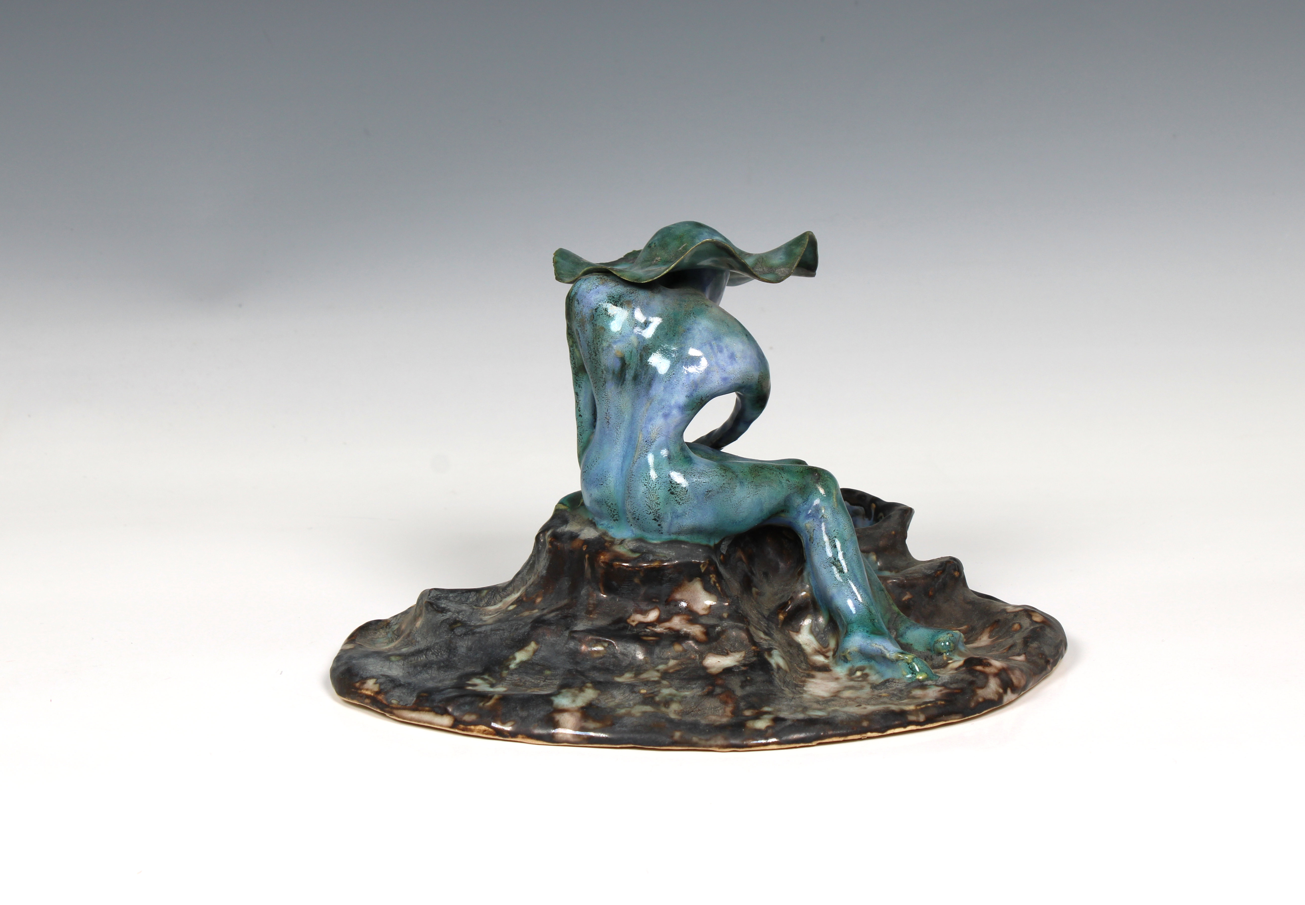 Elizabeth Ann Macphail (1939-89) A turquoise glazed stylised female figure relaxing by a garden pond - Image 3 of 5