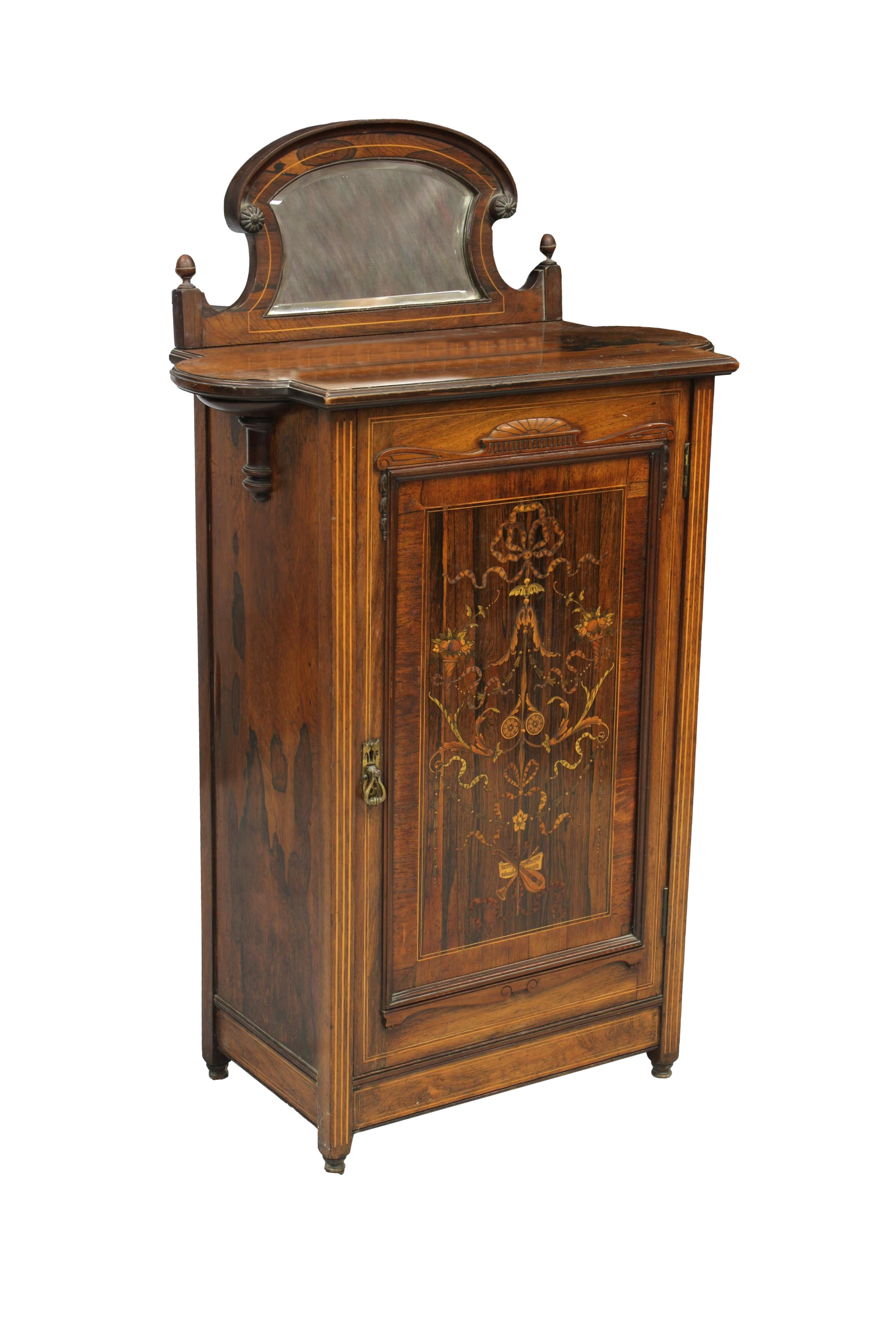 An Edwardian marquetry and rosewood music cabinet