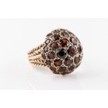 A garnet bombe ring