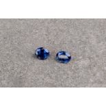 A pair of loose, oval cut blue sapphire