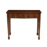 An early 20th century mahogany serpentine console table