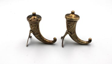 A pair of Norwegian silver gilt cornucopia / horn pepper pots