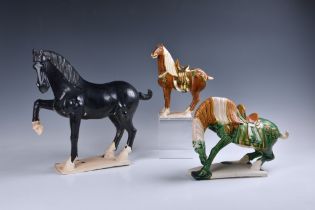 Three Chinese Tang style pottery horses, 20th century