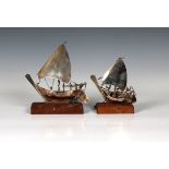 Two Middle Eastern white metal models of Dhows