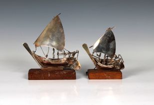 Two Middle Eastern white metal models of Dhows