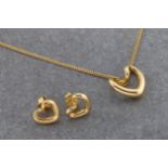 An 18ct yellow gold heart pendant