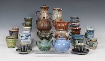 Elizabeth Ann Macphail (1939-89) A large collection of teapots, milk jugs, cups / mugs