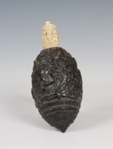 A finely carved ( Bugbear) "BATAILLE D' AUSTERLITZ" (Battle of Austerlitz) coconut powder flask