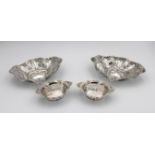 A pair of small pierced silver baskets