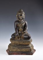 A 19th century Burmese Mandalay dry lacquer seated figure of Buddha