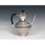 A Victorian silver baluster half fluted coffee pot