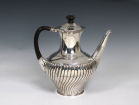 A Victorian silver baluster half fluted coffee pot