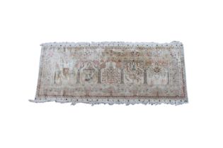 A Turkish Hereke Saff/Saph silk rug, signed