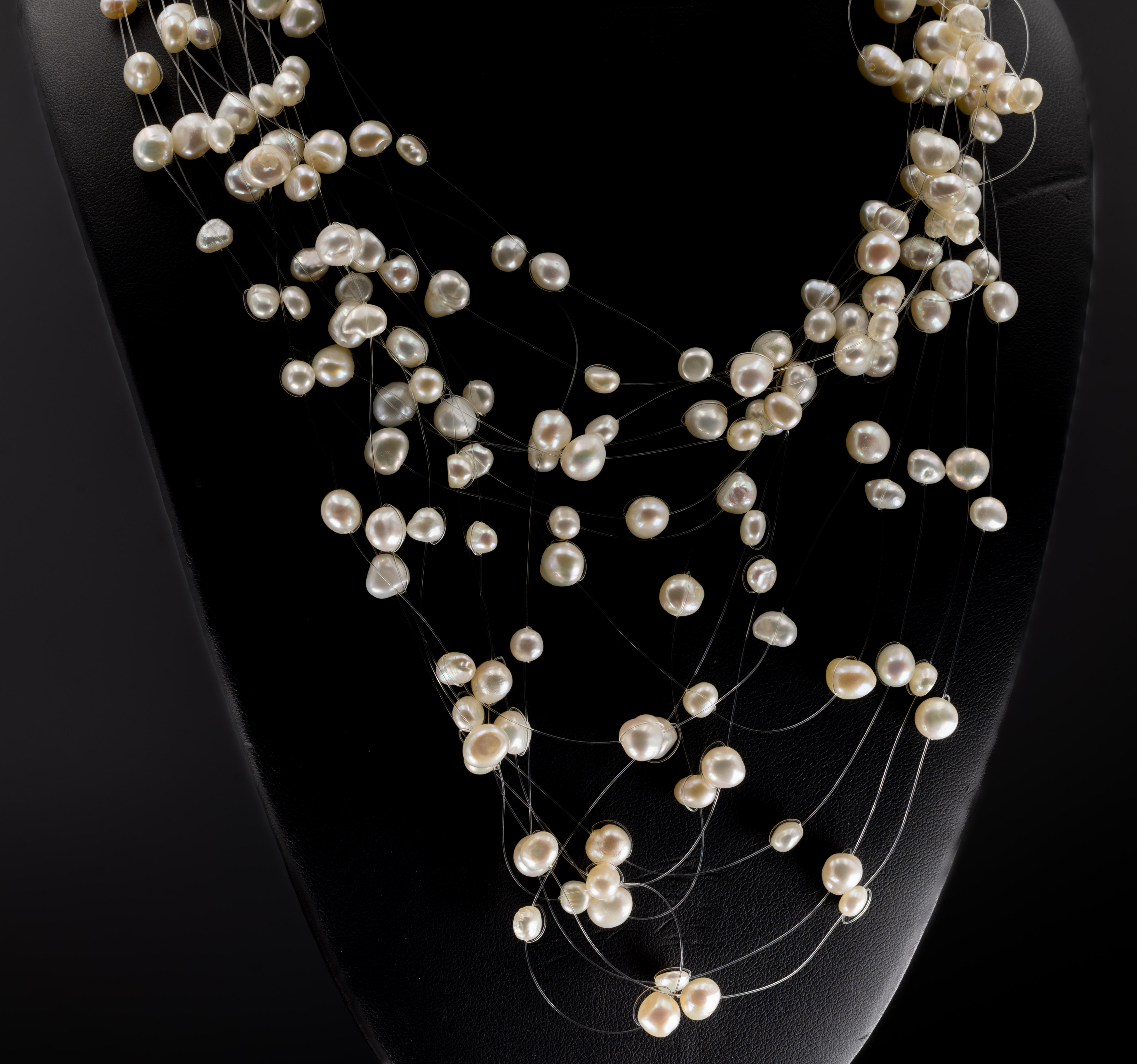 A scattered pearl necklace