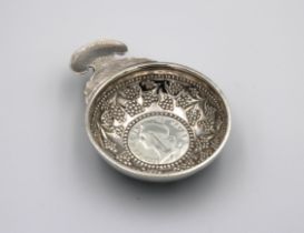 A white metal (silver) tastevin inset with a Louis XV silver ecu coin dated 1769