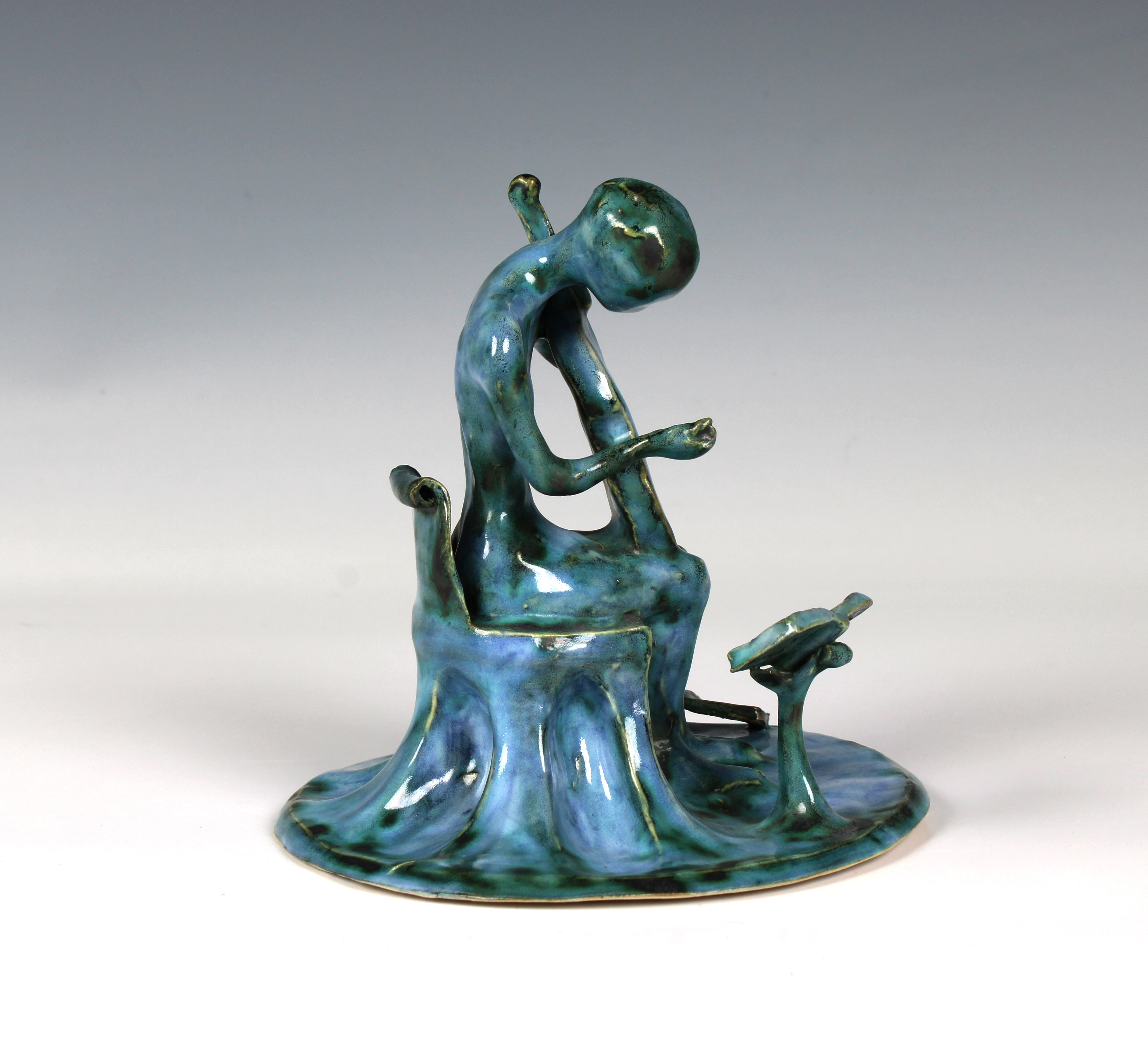 Elizabeth Ann Macphail (1939-89) A turquoise glazed stylised cellist or violin player sculpture - Image 2 of 4