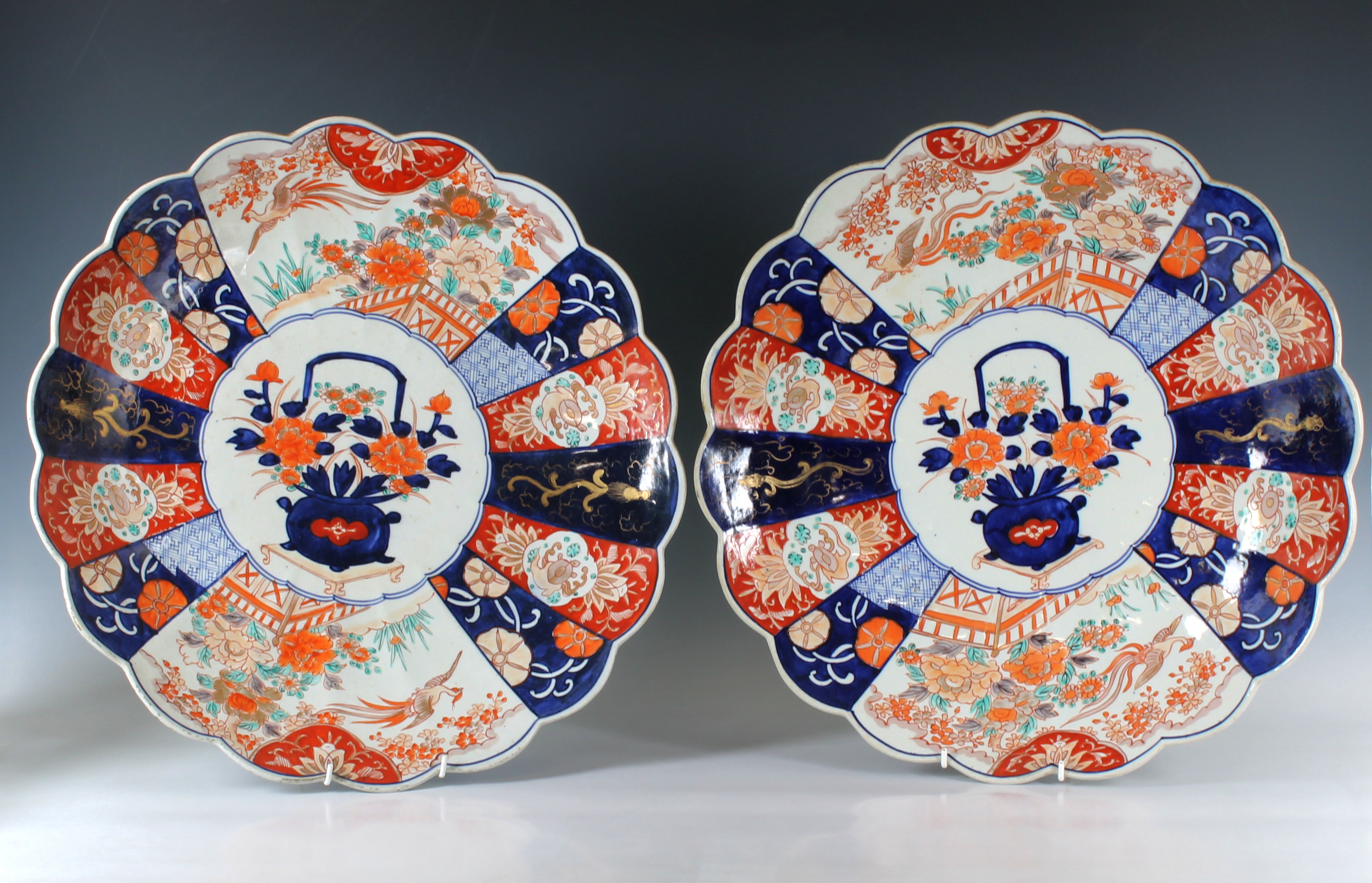 A pair of impressive large Japanese Imari scalloped circular chargers