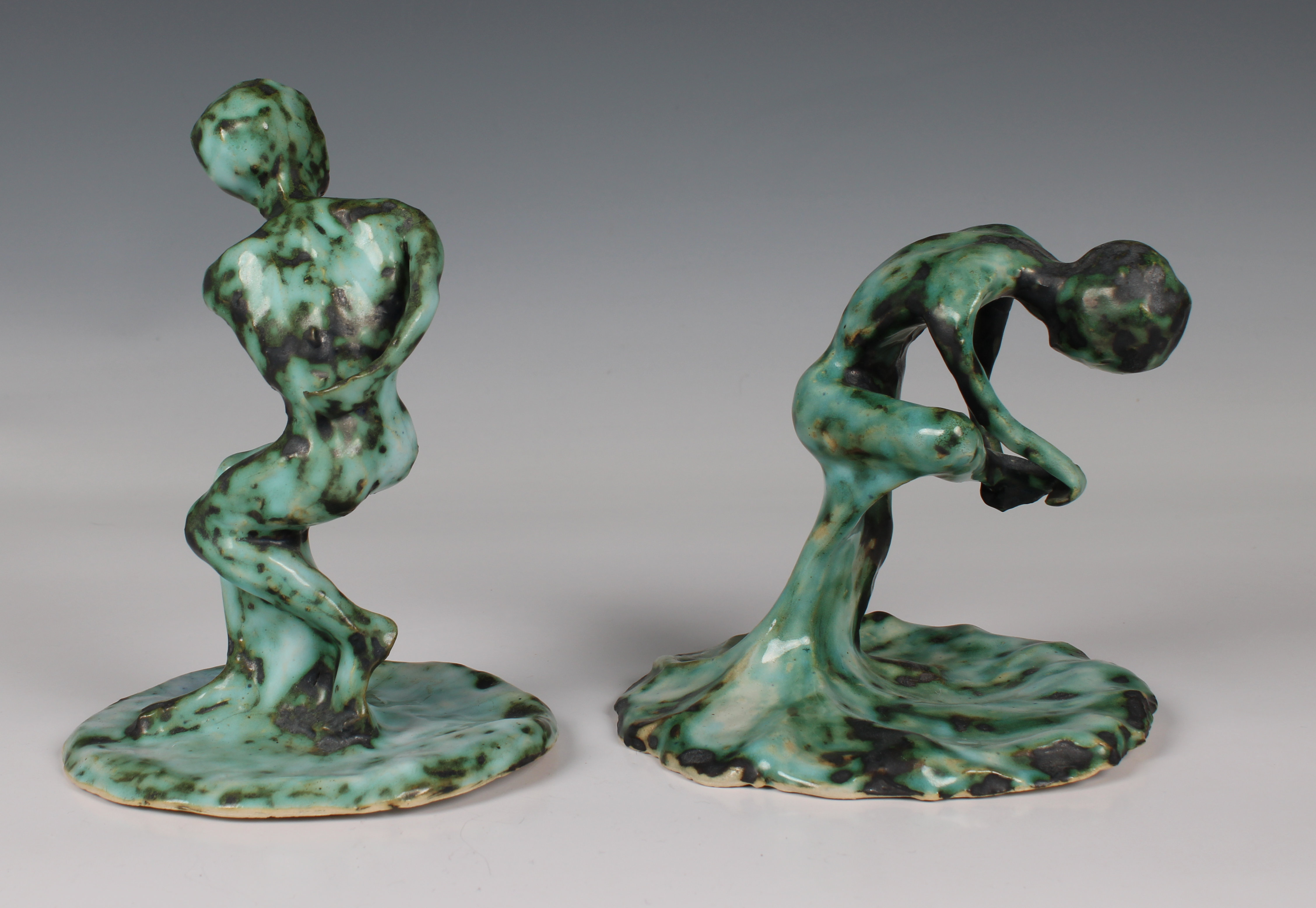Elizabeth Ann Macphail (1939-89) Two green glazed stylised figural sculptures 'Before & After' - Image 2 of 4
