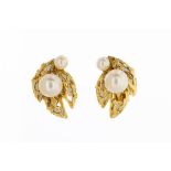 A pair of pearl gold leaf earrings