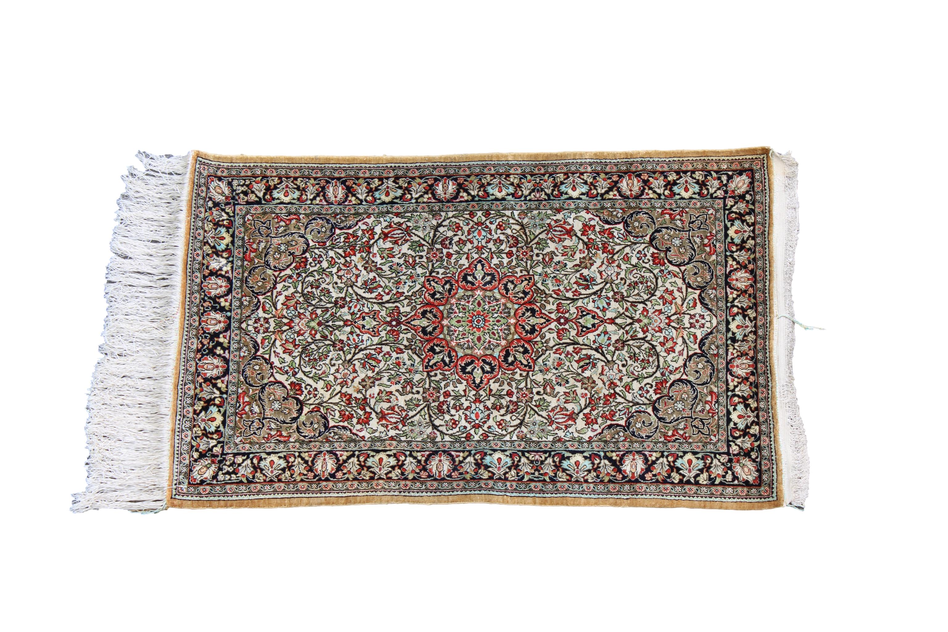 A silk Qum rug