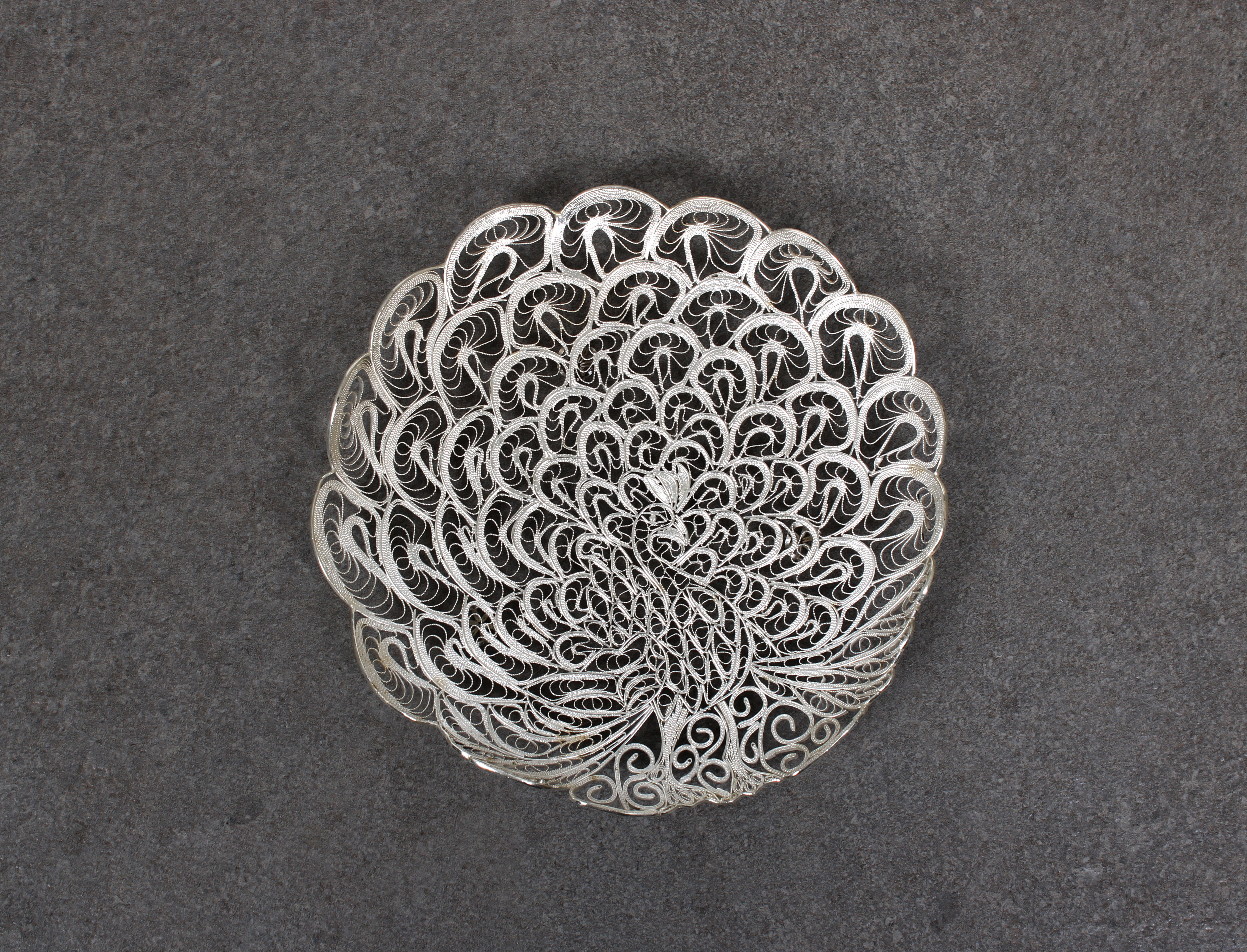 An ornate silver filigree peacock trinket tray / dish