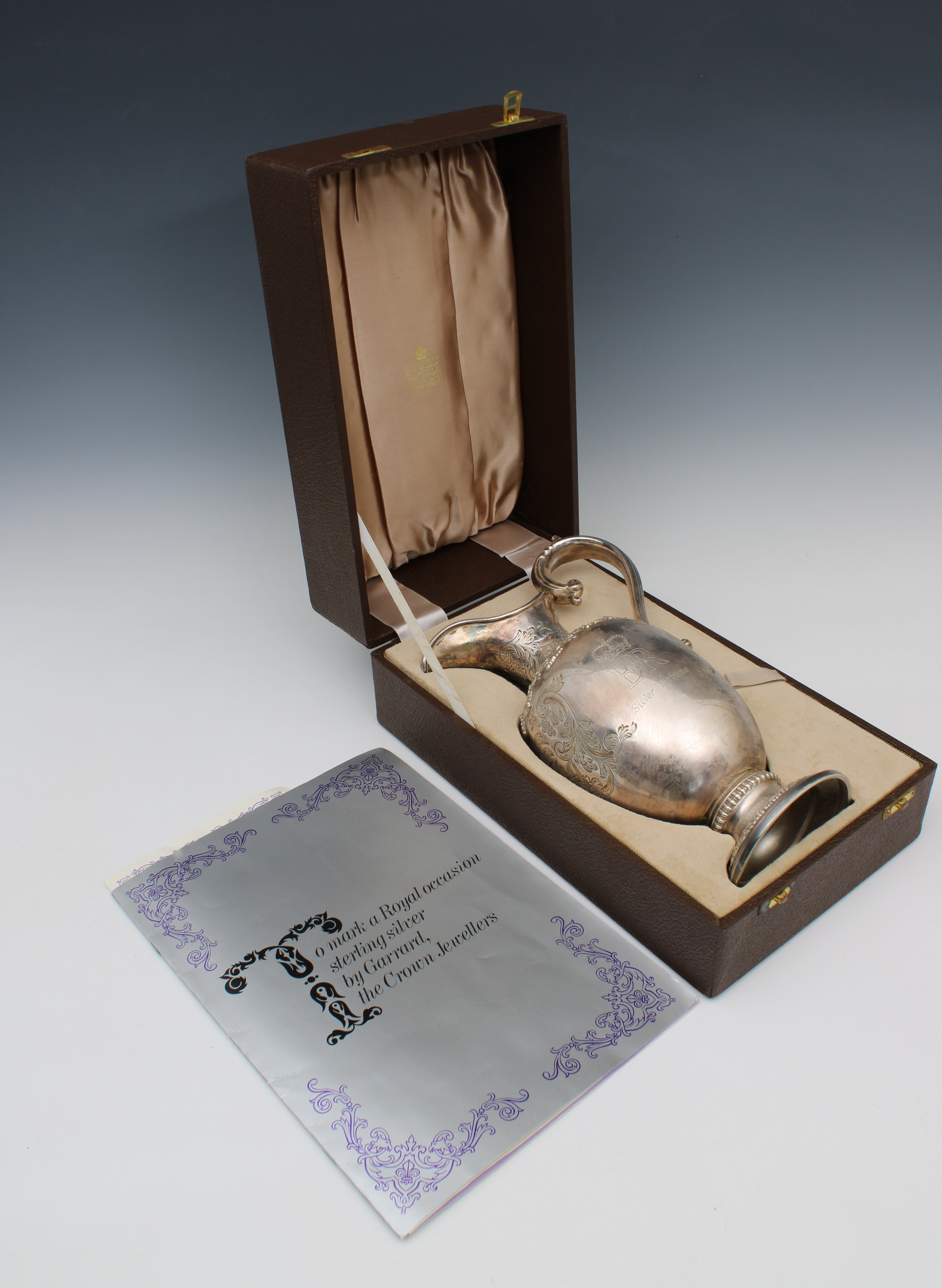 A Garrard silver limited edition wine jug / ewer commemorating the silver wedding of HM Queen Elizab - Image 6 of 6
