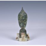 A Chinese bronze and calcified jade Northern Wei figure of Guanyin