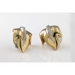 A pair of 18ct yellow gold and diamond leaf earrings