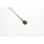A 9ct yellow gold emerald and diamond cluster pendant