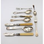 A collection of various silver / white metal flatware