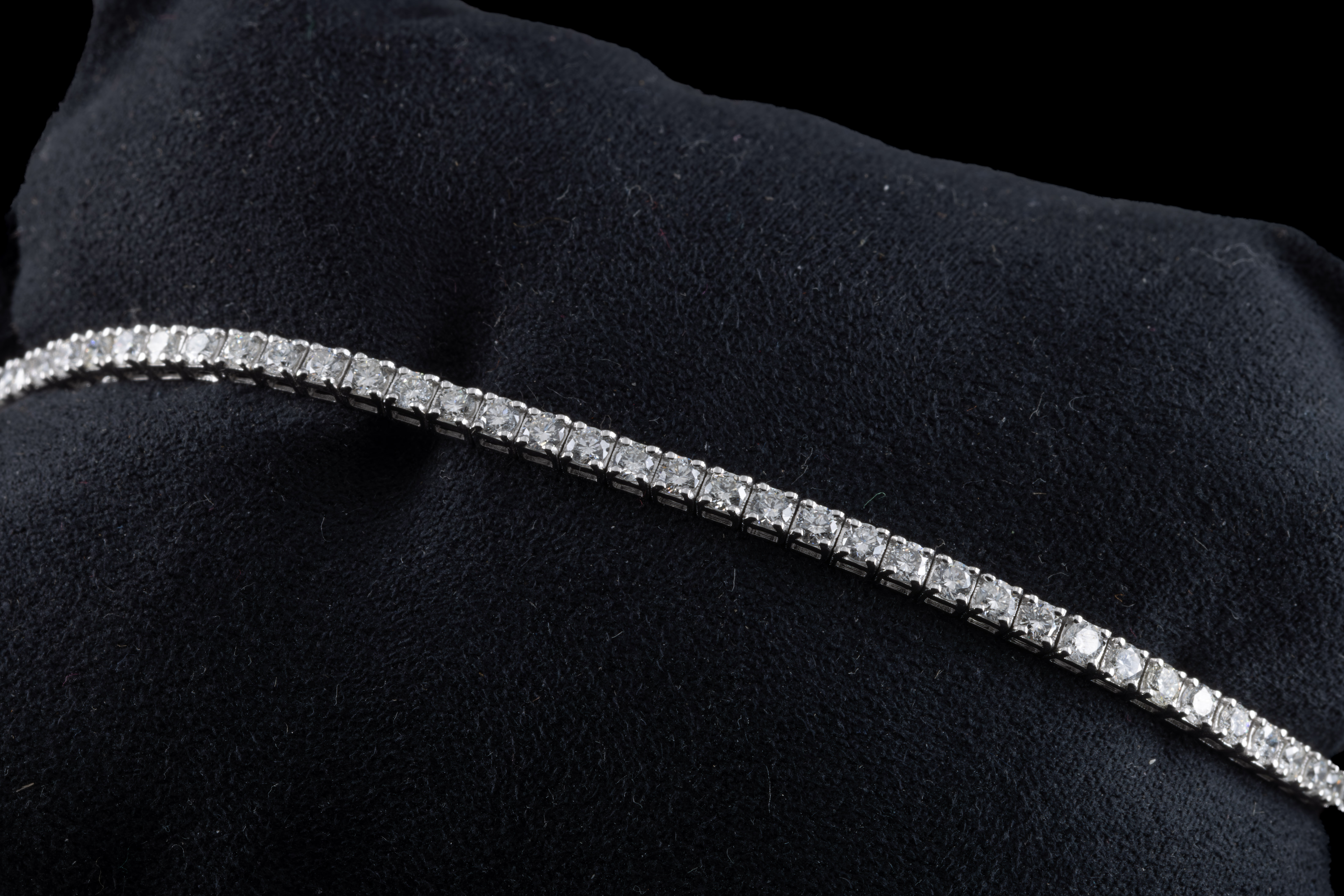 An 18ct white diamond line bracelet